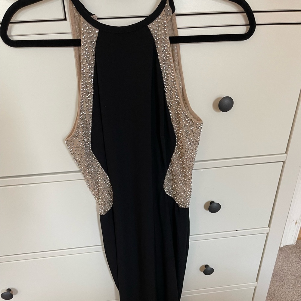 Worn once for a very short evening. Bought at Nordstrom for $99.99 does not fit